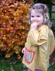 Traditional children's mustard linen smock, Stripes pocket